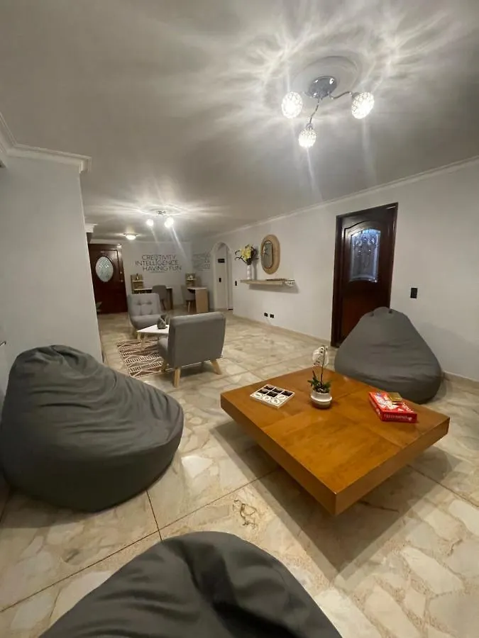 Проживание в семье Lindo Y Nuevo Alojamiento Laureles, Habitacion Privada Медельин Колумбия
